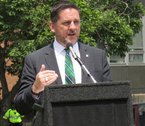 Mayor Mark Holland spoke at a memorial dedication today at the Wyandotte County Courthouse lawn. (Staff photo)