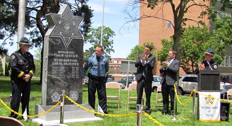 A new memorial statue honoring fallen Wyandotte County Sheriff's officers  was unveiled today on the lawn of the Wyandotte County Courthouse. (Staff photo)