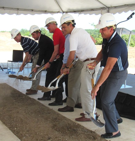 Breaking ground for the new U.S. Soccer Training Center at 98th and Parallel Parkway in Kansas City, Kan., on Sunday afternoon were, left to right, Gov. Sam Brownback, Mayor Mark Holland, Dan Flynn of U.S. Soccer; Dr. Randall O'Donnell of Children's Mercy Hospital; U.S. Rep. Kevin Yoder; and Robb Heineman of Sporting Kansas City. (Staff photo by Mary Rupert)