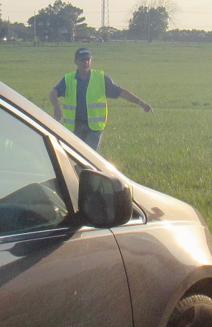 Dave Hurrelbrink was volunteering to direct parking on Wednesday at the Wyandotte County Fair. (Staff photo by Mary Rupert)