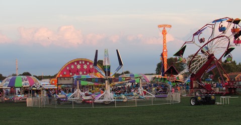 Carnival rides were part of the Wyandotte County Fair on Wednesday night. (Staff photo by Mary Rupert) 