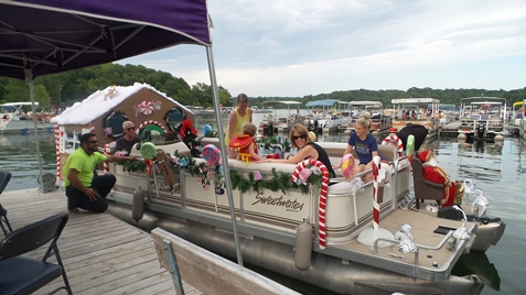 A gingerbread house was the theme of another boat’s decorations. (Photo by Lou Braswell)