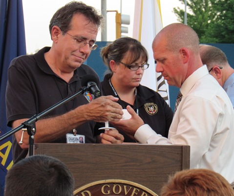 A candlelighting ceremony was held Wednesday night for Capt. Robert David Melton at Kansas City, Kan., City Hall. (Staff photo by Mary Rupert)