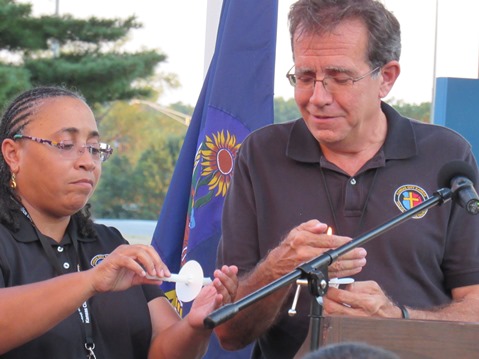 A candlelighting ceremony was held Wednesday night for Capt. Robert David Melton at Kansas City, Kan., City Hall. (Staff photo by Mary Rupert)