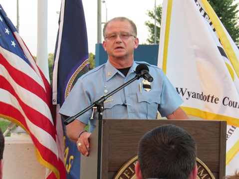 Kansas City, Kan., Police Chief Terry Zeigler spoke Wednesday night at the candlelighting ceremony for Capt. Robert David Melton. (Staff photo by Mary Rupert)