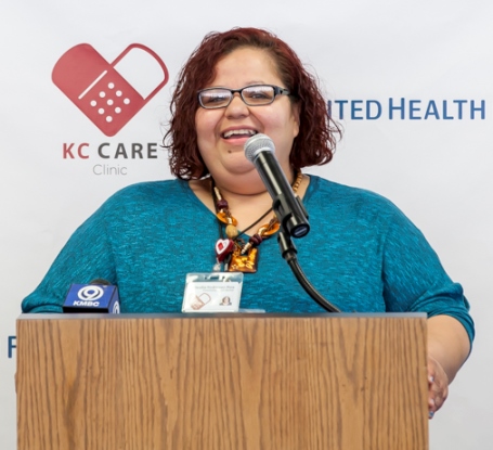 Community health worker Claudia Rodriguez-Rios addressed attendees at a community event Aug. 10 at which the Community Health Council of Wyandotte County, in partnership with Kansas City CARE Clinic, was awarded a $1.9 million grant from United Health Foundation to support its recently launched Community Health Worker Collaborative. As one of seven new community health workers engaged in the local initiative, Rodriguez-Rios spoke of her passion in supporting Wyandotte County residents in accessing the care and resources to address social and health needs. (Photo from CHC and United Health Foundation)