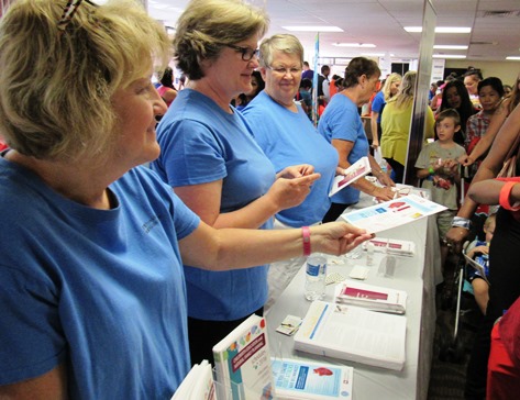 Providence Medical Center staffed a table at the Back-to-School Fair today at Kansas City Kansas Community College. (Staff photo)