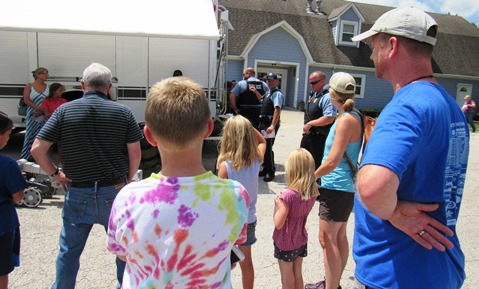 Kansas City, Kan., police demonstrated some of their equipment Saturday at the Grinter Summerfest, 78th and K-32. The event continues through 4 p.m. Saturday. (Staff photo)