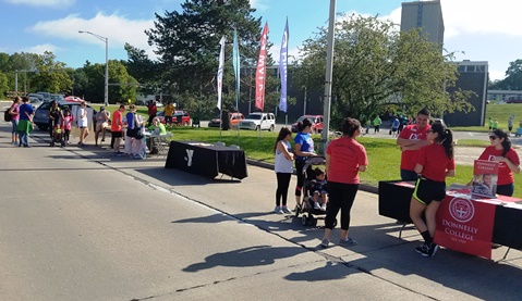 Information booths were at the Library in the Park event today at Big Eleven Lake, 11th and State Avenue. The event, from 10 a.m. to 2 p.m., features free food and entertainment, along with a children’s book giveaway, activities and booths. For more information visit, https://wyandotteonline.com/library-in-the-park-event-saturday-to-feature-newbery-award-winning-book-giveaway-food-entertainment/. (Photo by William Crum)