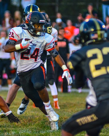 Bonner Springs senior running back Tobias Womack (24) cut back against the defense on his way to scoring a touchdown in the second quarter of the game. (Photo by Brian Turrel)