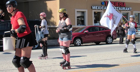 Scenes from the Central Avenue Parade held Saturday morning, Sept. 10, in Kansas City, Kan. The Kansas City Roller Warriors skated through the parade route. (Staff photo by Mary Rupert)