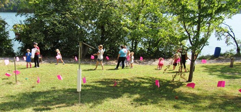 Children and adults played the monarch migration challenge game on the lawn at the Schlagle Library at Wyandotte County Lake Park on Saturday. (Staff photo by Mary Rupert)