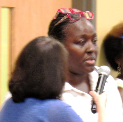 Janice Witt, right,  director of the Reola Grant Center food pantry, at the forum Tuesday talked about the effects of hunger and malnutrition on behavior. (Staff photo by Mary Rupert)