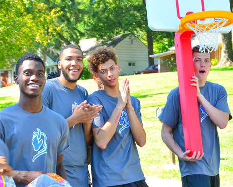 Members of the Kansas City Kansas Community College men’s basketball team marched together in the Leavenworth Road Parade on Sept. 18. (Photo by Brian Turrel)