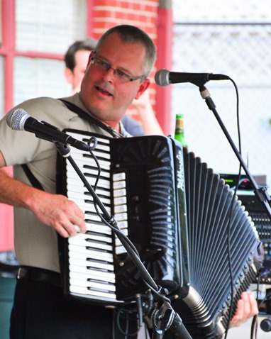 Brian McCarty, accordion player and leader of the Brian McCarty Band, entertained the crowd with Slovenian songs and dance music at Slovenefest on Sept. 24. (Photo by Brian Turrel)