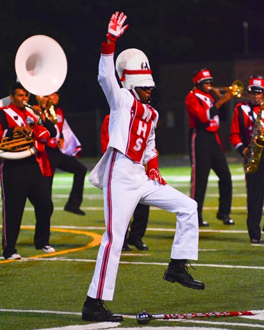 Tyler Thompson, drum major of the Wyandotte High School marching band, performed with the band during halftime of the football game with Atchison High School on Sept. 23. (Photo by Brian Turrel) 