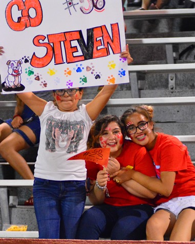 Fans of the Wyandotte High School football team cheered on their favorite players during the game against Atchison High School on Sept. 23. (Photo by Brian Turrel)