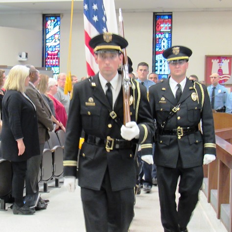 An honor guard presented the colors during police graduation Thursday night at Kansas City, Kan., City Hall. (Staff photo)