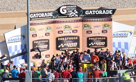 Kevin Harvick received a trophy for winning the Hollywood Casino 400 Sunday at the Kansas Speedway, Kansas City, Kan. (Fan photo)