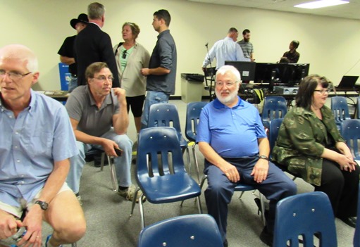 Supporters of Kevin Braun, a Republican candidate for the 36th House District, and Sen. Steve Fitzgerald, during a break in the candidate forum Monday night at Kansas City Kansas Community College. (Staff photo)