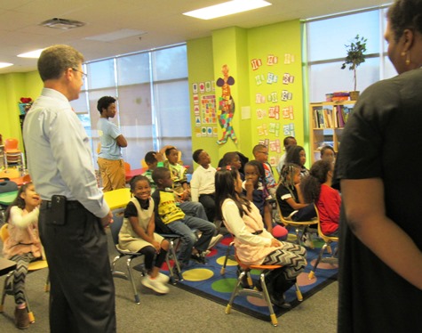 Gov. Sam Brownback, left, visited a classroom at the Boys and Girls Club on Thursday in Kansas City, Kan. (Staff photo)