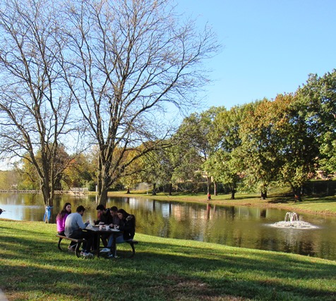 Several persons attending today's dedication ate a breakfast by the pond or lake at KCKCC. (Staff photo)