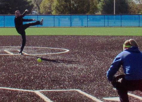 Mayor Mark Holland threw out the first pitch on the new KCKCC softball field after Saturday's ribbon-cutting. (Staff photo)