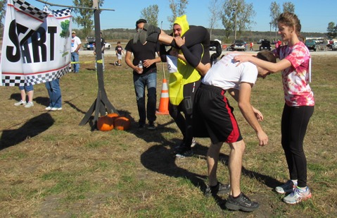 Couples prepared to start the wife-carry event on Saturday at Lakeside Speedway, Kansas City, Kan. (Staff photo)