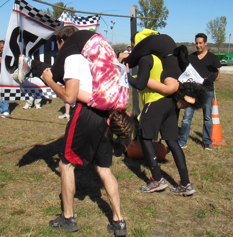 The wife-carry event's start on Saturday at Lakeside Speedway in Kansas City, Kan. (Staff photo)