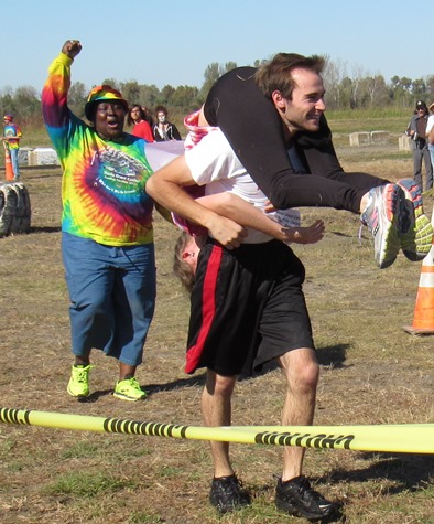 Coordinator Janice Witt urged a couple from Nebraska to get up and finish the race. (Staff photo)