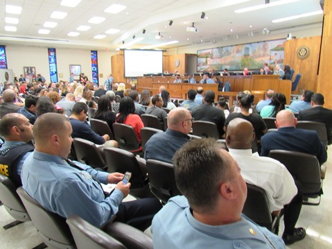 A crowd gathered to watch the graduation of nine police recruits on Thursday night at Kansas City, Kan., City Hall. (Staff photo)