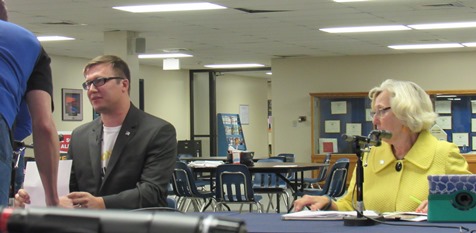 Jason Conley, left, a Libertarian candidate, and state Sen. Pat Pettey, D-6th Dist., before the start of their portion of the candidate forum on Monday night at Kansas City Kansas Community College. (Staff photo)