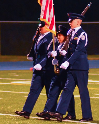 The Washington High School Air Force ROTC color guard presented the flag before the game. (Photo by Brian Turrel)