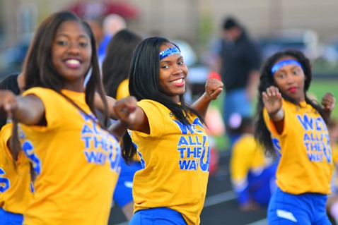 Members of the Schlagle Auxiliary performed before the start of the football game against Sumner on Oct. 7 at Schlagle Stadium. (Photo by Brian Turrel)