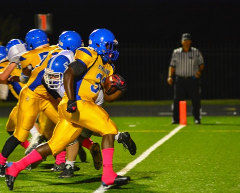 Neil Ruff crossed the goal line for his second touchdown of the first quarter. (Photo by Brian Turrel)