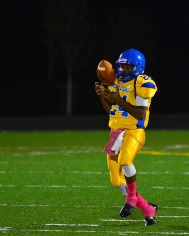 Schlagle senior wide receiver Dominique Sanders fielded a punt during the second quarter of the game against Sumner on Oct. 7. (Photo by Brian Turrel)