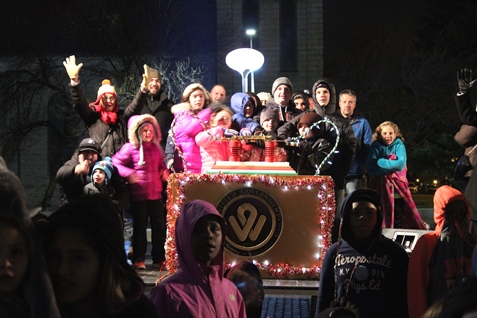 The children of two slain Kansas City, Kan., police officers, Detective Brad Lancaster and Capt. Robert David Melton, threw the switch for the holiday lights tonight at Kansas City, Kan., City Hall.  (Photo by Steve Rupert)