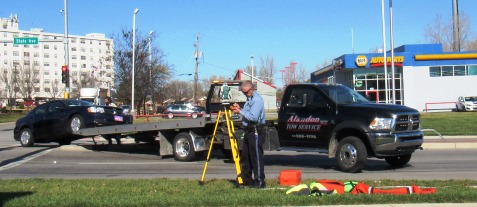 Kansas City, Kan., police investigated a crash scene near 75th Place and State Avenue today. A Dodge Avenger was hit by a Nissan in the crash. The occupants of the Nissan allegedly were trying to pass a bad check at the Bank of America at 78th and State before the crash occurred. (Staff photo by Mary Rupert)