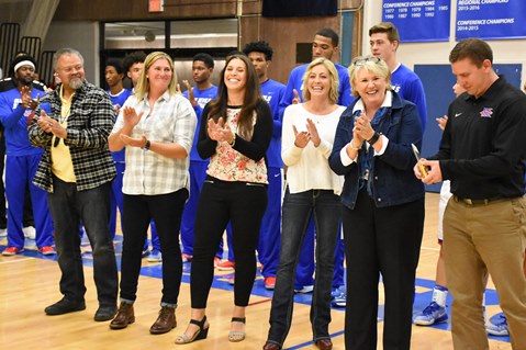 The presentation of the 2016 Athletic Hall of Fame plaque by KCKCC Athletic Director Tony Tompkins was widely applauded by members of the 1996-1997 women’s basketball team, from left, Don Malone, father of starting point guard Maryam Malone; Kacy Tillery, Heather Horyna, Mellisa Washburn and head coach Leslie Crane. (KCKCC photo by Alan Hoskins)