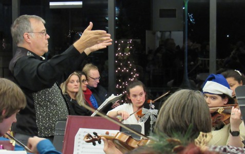 The Kansas City, Kan., Community Orchestra performed holiday music Friday night at the lighting ceremony at City Hall. (Staff photo by Mary Rupert)