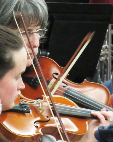 The Kansas City, Kan., Community Orchestra performed holiday music Friday night at the lighting ceremony at City Hall. (Staff photo by Mary Rupert)