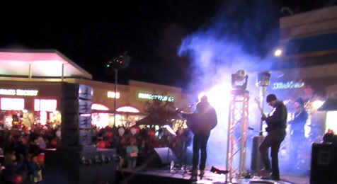 Several local musicians played holiday music at the tree lighting ceremony tonight at the Legends Outlets in Kansas City, Kan. (Staff photo by Mary Rupert)