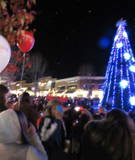 The holiday lights were turned on after a countdown and a balloon release tonight at the Legends Outlets in Kansas City, Kan. (Staff photo by Mary Rupert)