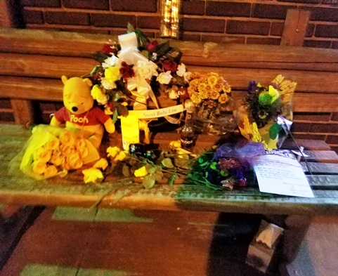 A memorial for Louis M. Scherzer, who died after a shooting Nov. 27, was placed in the 500 block of Central Avenue in Kansas City, Kan. (Photo by William Crum)