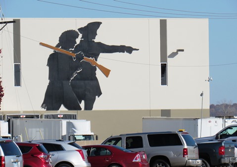 A new Lewis and Clark metal mural overlooks Kaw Point from the NorthPoint building at the levee in Kansas City, Kan. (Staff photo by Mary Rupert)