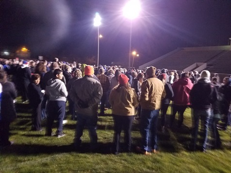 A prayer vigil to remember Louis M. Scherzer was held about 6:30 p.m. Tuesday at Bishop Ward's Dorney Field near 14th and Armstrong in Kansas City, Kan. Scherzer, 29, died after a shooting on Nov. 27 in the 500 block of Central Avenue in Kansas City, Kan. An estimated 750 people attended the prayer vigil. Charges were filed today against an 18-year-old man in this case. (Photo by William Crum)