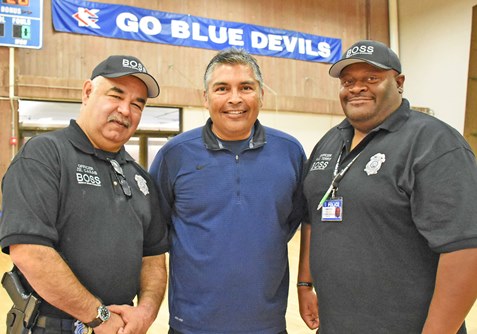 A joint program coordinated by KCK Community Police officers Jesus Casas, left, and Kevin Terry, right, and KCKCC men’s soccer coach Ruben Rodriguez is being offered fifth grade students in four schools to promote improvement in the areas of academics, attendance and attitude. (KCKCC photo by Alan Hoskins) 