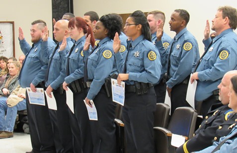 Eleven Wyandotte County Sheriff’s deputies graduated in ceremonies tonight at Kansas City, Kan., City Hall. (Staff photo by Mary Rupert)