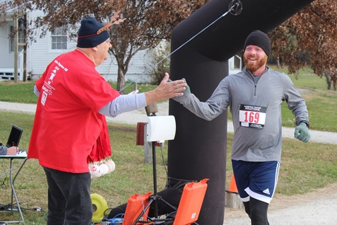 It’s not always about how you start. Sometimes it’s about how you finish. Runners at the Santa Express 5K and Reindeer Route at the National Agricultural Center and Hall of Fame, Bonner Springs, finished their 5K and 1-mile routes Saturday with style. (Photo by Steve Rupert)