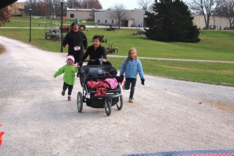 It’s not always about how you start. Sometimes it’s about how you finish. Runners at the Santa Express 5K and Reindeer Route at the National Agricultural Center and Hall of Fame, Bonner Springs, finished their 5K and 1-mile routes Saturday with style. (Photo by Steve Rupert)